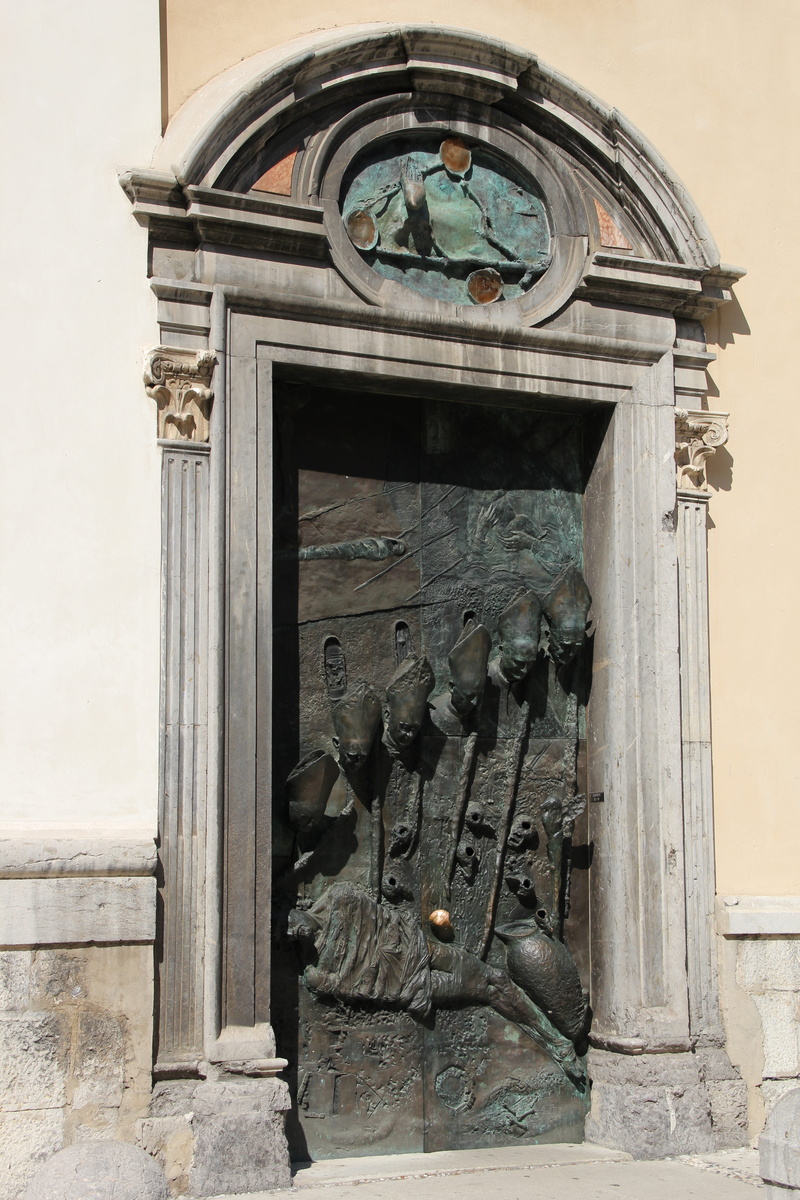 statue, place of worship, Ljubljana, art, day, Door, outdoors, building, religion, architecture, building exterior, craft, male likeness, history, the past