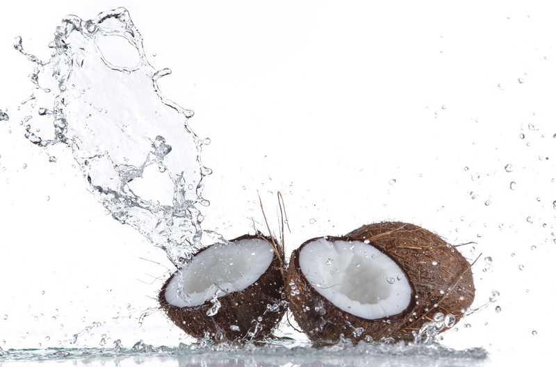 food, splashing, food and drink, indoors, high angle view, close-up, white background, motion, wet, high-speed photography, coconut, drop, water, studio shot