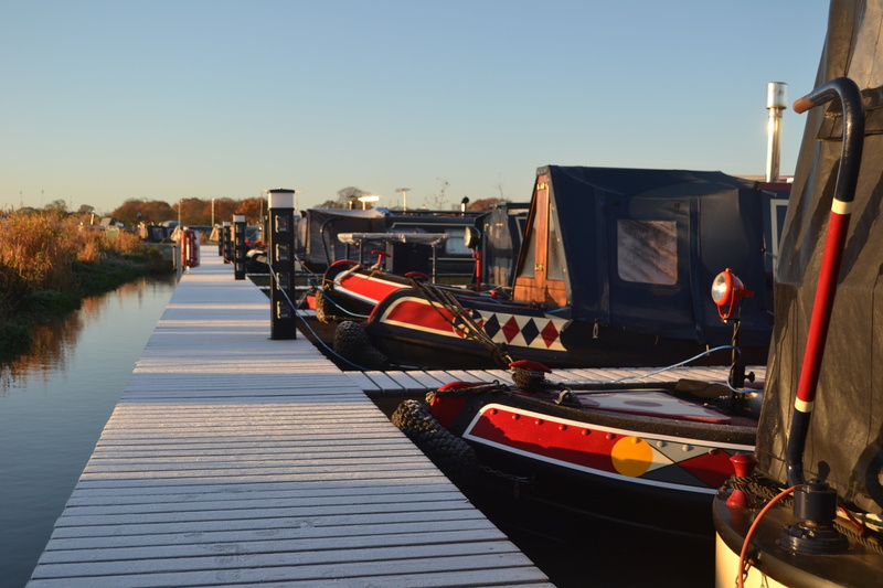 clear sky, houseboat, waterway, built structure, moored, barge, towpath, english, countryside, sky, wood - material, nature, water, harbor, port, architecture