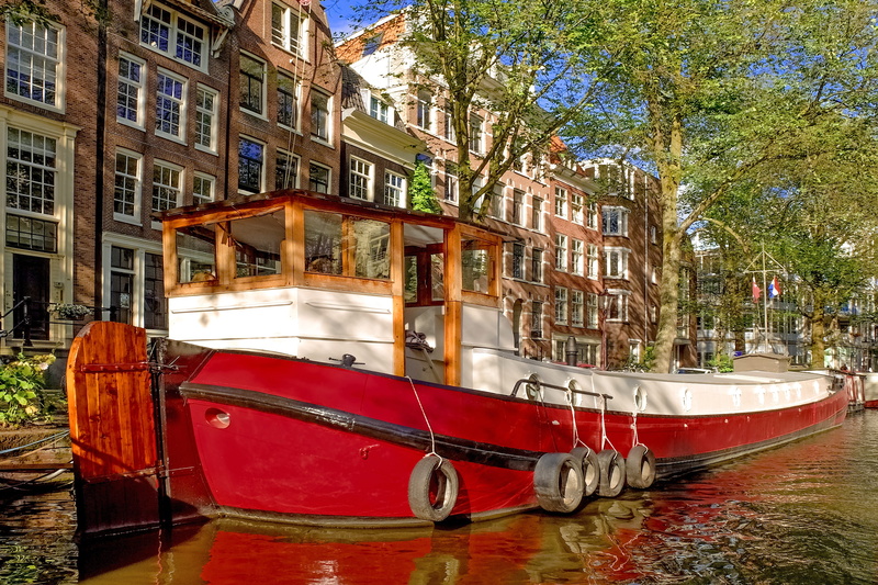 moored, houseboat, buildings, concrete, city, transportation, built structure, boat, ship, tree, nature, no people, netherlands, architecture, travel, day