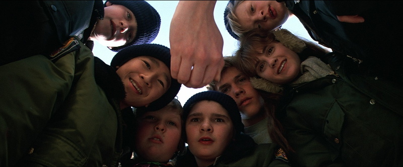 huddling, headshot, boys, portrait, medium group of people, offspring, togetherness, bonding, clothing, the goonies, adult, directly below, childhood, sport