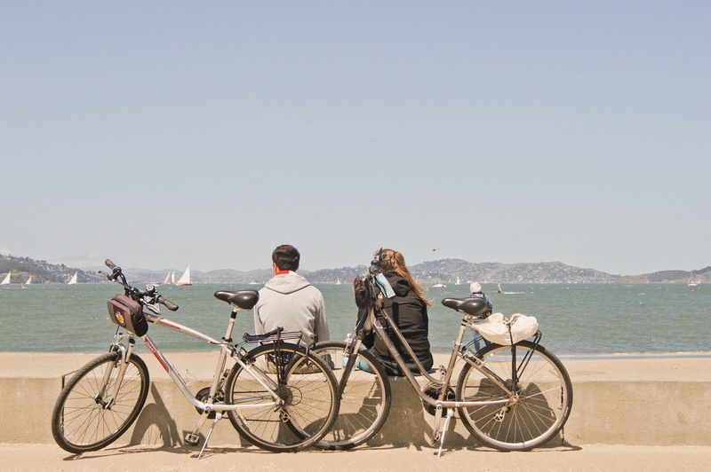 day, clear sky, outdoors, vacation, togetherness, beside, trip, men, group of people, leisure activity, sea, women, happiness, bike, love, water, nature