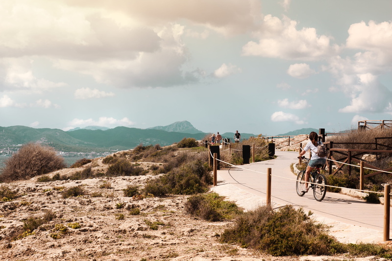 mountains, non-urban scene, lifestyles, sea, cloud - sky, majorca, land vehicle, day, people, 4K, beauty in nature, outdoors, mountain range, cycle, nature