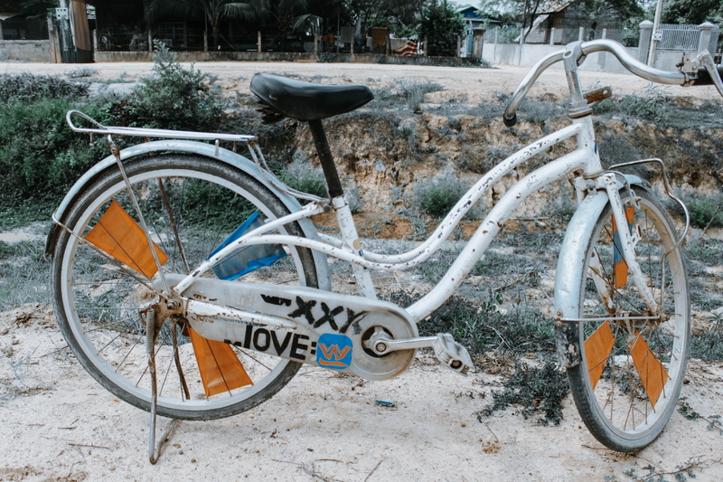 stationary, travel, no people, bicycle, outdoors, cambodia, city, love, world, field, 5K, land vehicle, mode of transportation, abandoned, land, phnom penh