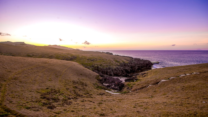 land, scenics - nature, travel destinations, batan island, water, philippines, adventure, landscape, tranquility, sunset, sky, tranquil scene, purple sky