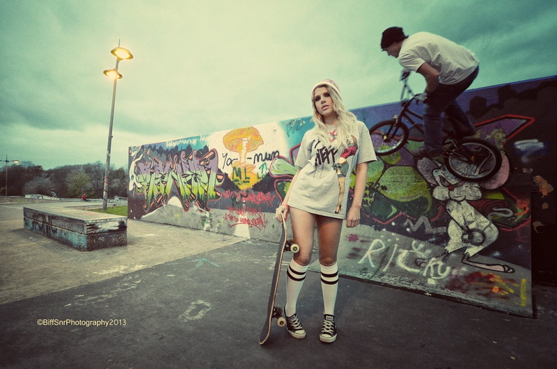 young adult, lifestyles, graffiti, architecture, shirt, full length, transportation, young men, people, casual clothing, street, young women, mode of transportation