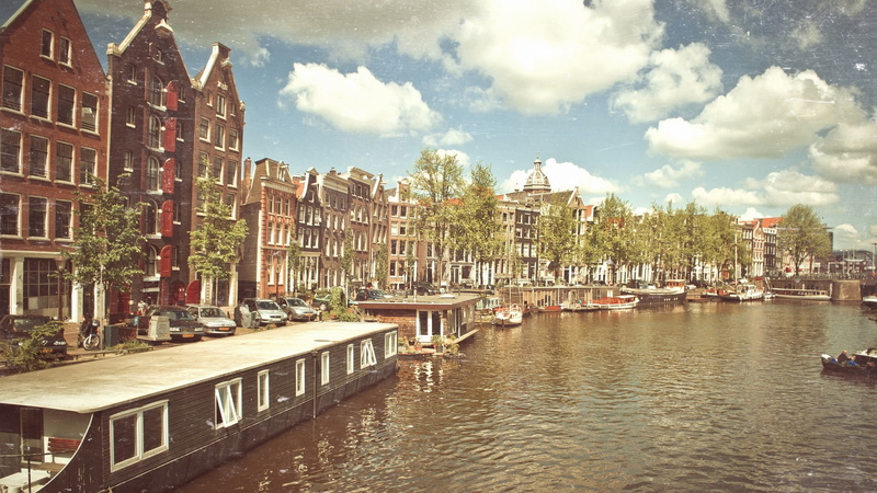 Amsterdam, building, building exterior, day, sky, sailboat, river, mode of transportation, moored, no people, cityscape, marina, nature, residential district