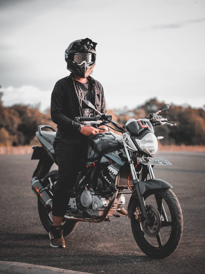 men, blurred background, wheels, man, one person, daylight, motorcyclist, young adult, helmet, riding, rider, transportation system, gray, adult, transportation
