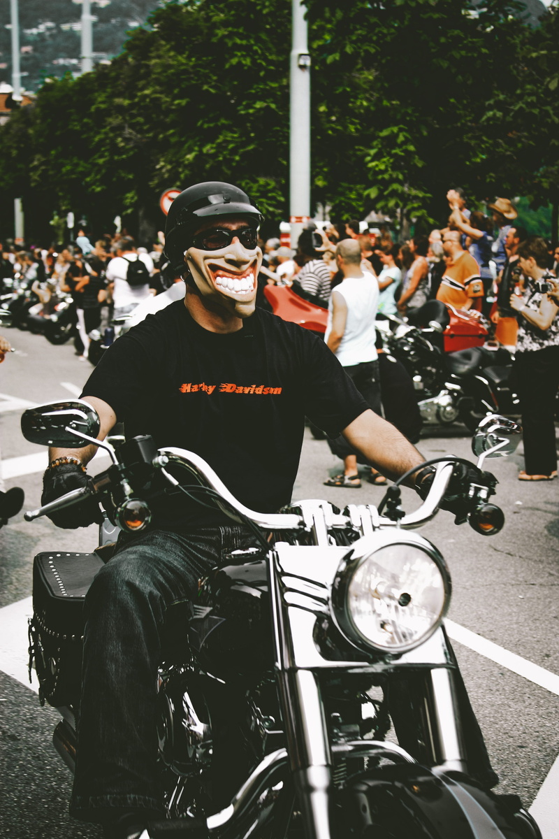 wear, outdoors, roadway, motorcycle, rider, expensive, group of people, chopper, wearing, three quarter length, biking, male, audience, mask, people, street