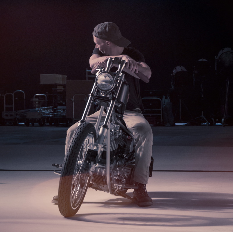 young adult, adult, shovelhead, 2K, city, custom, power, motorcycle, indoors, side view, wheels, sport, custom chopper, standing, car, custom bike, lens flare