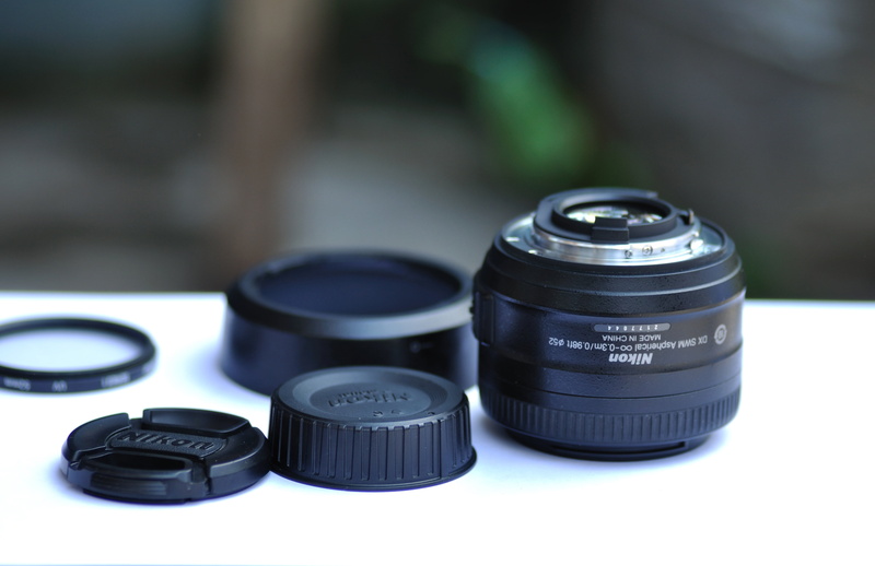 photojournalism, the media, nikon, viewfinder, table, front, close-up, studio, service, camera, studio shot, single object, camera lens, photographer, photography themes