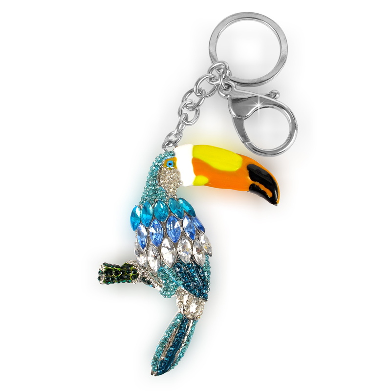 toucan, personal accessory, yellow, chain, silver colored, colored, fashion, key ring, copy space, bird, blue, cut out, no people, indoors, studio shot