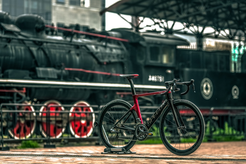 no people, built structure, street, red, wheel, city, building exterior, cycling, black, bike, architecture, travel, land vehicle, 5K, stationary, train