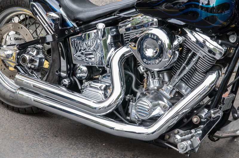 two wheeled vehicle, chrome plated, silver colored, engine, chrome, construction, harley davidson, car, motors, outdoors, shiny, luxury, travel, close up