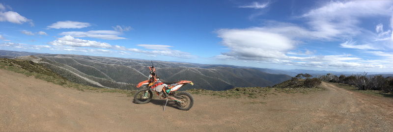 cloud - sky, victoria, activity, day, ktm, mode of transport, mountain range, men, orange, dirt, ride, bike, speed, adventure, sports helmet, bicycle, nature