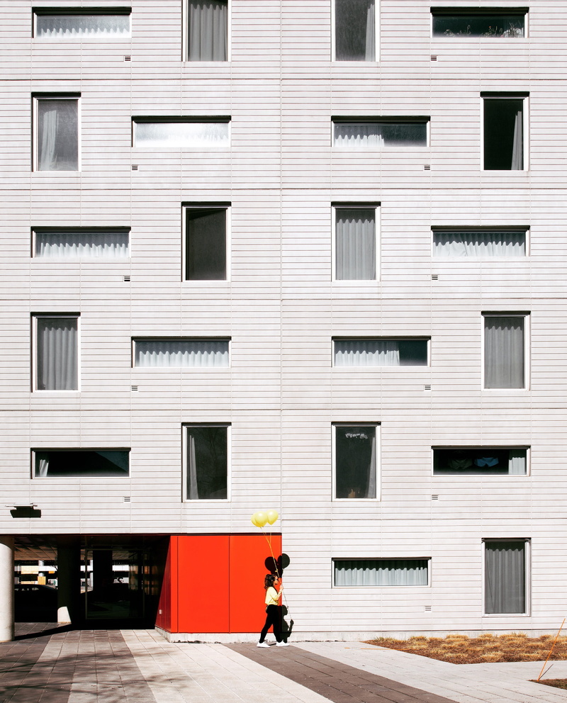 only men, city, walking, architecture, high rise building, full length, building Exterior, holding, yellow balloon, one man only, real people, people, high