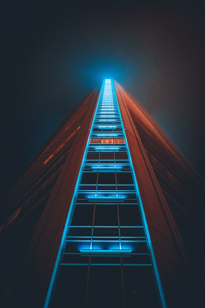 night, outdoors, illuminated, duke energy center, building exterior, sky, mood, low angle view, tall - high, architecture, office, blue, modern, sky scraper