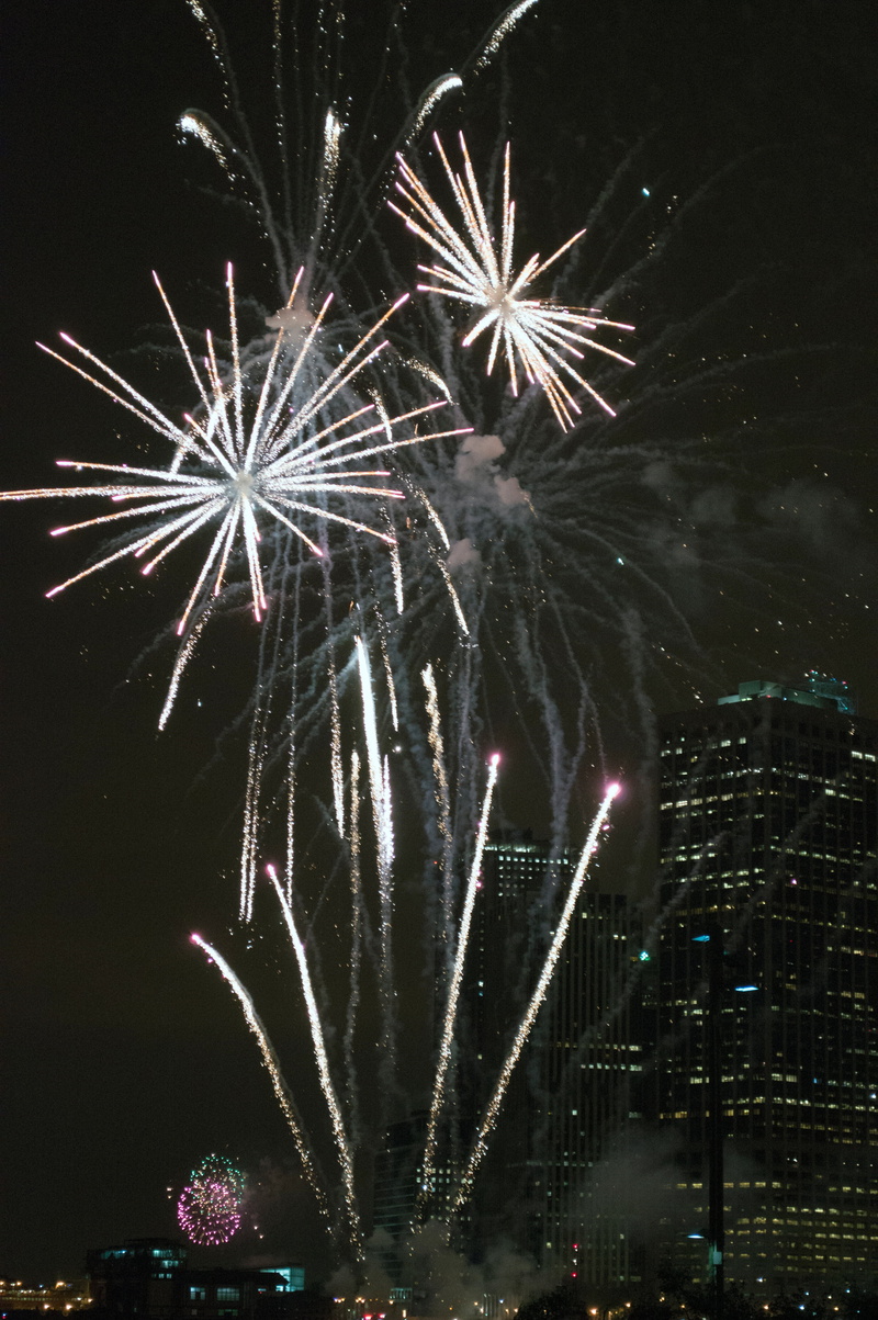 firework display, urban, explosive, firework - man made object, light, nature, illuminated, outdoors, nightlife, exploding, lights, sparkling, night, low angle view