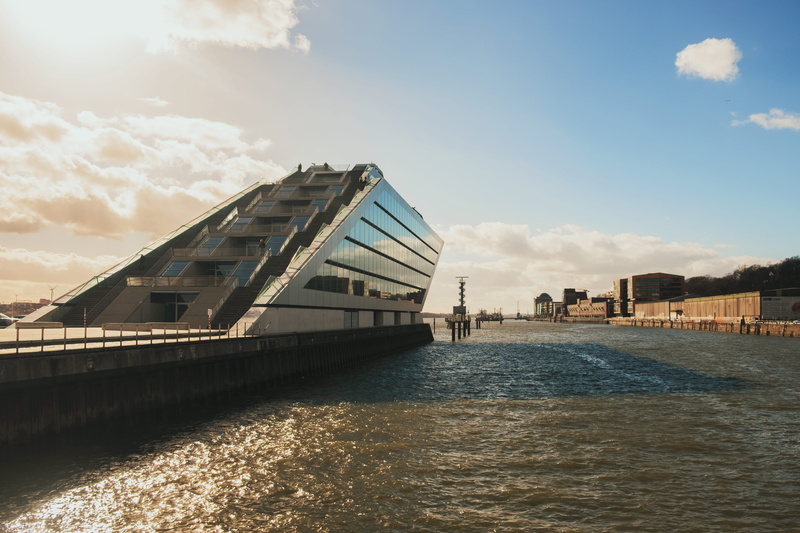 no people, outdoors, urban, river, office building, beside, sky, harbor, dock, waterfront, nautical vessel, connection, clear, built structure, sea, port