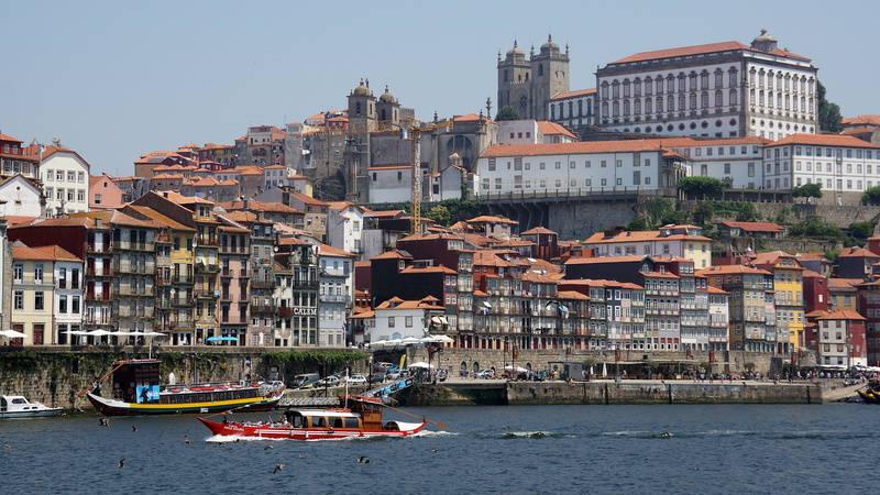 near, travel destinations, boats, portuguese, built structure, porto, water, city, outdoors, tourism, town, downtown, landmark, douro, day, no people, nature
