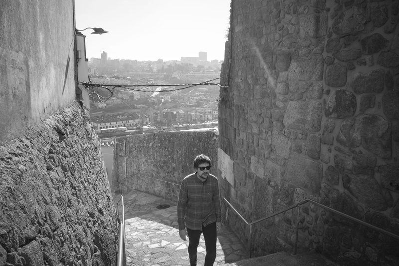 landscape, stone wall, lifestyles, real people, rear view, ribeira, warm clothing, three quarter length, wall - building feature, portugal, leisure activity