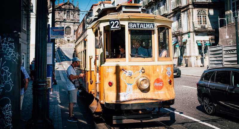 cultures, overhead Cable Car, land Vehicle, person, portugal, old, outdoors, street, people Traveling, man, europe, building Exterior, travel, tramway