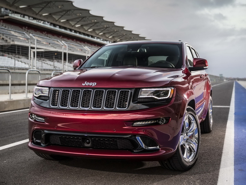 architecture, cherokee, built structure, suv, grand, day, SRT, car, vintage car, Jeep, mode of transportation, outdoors, city, sky, cloud - sky, red, stationary