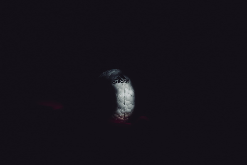 body part, team sport, football, soccer, vertebrate, dark, indoors, studio shot, medical imaging x-ray film, copy space, sports, digital composite, soccer ball