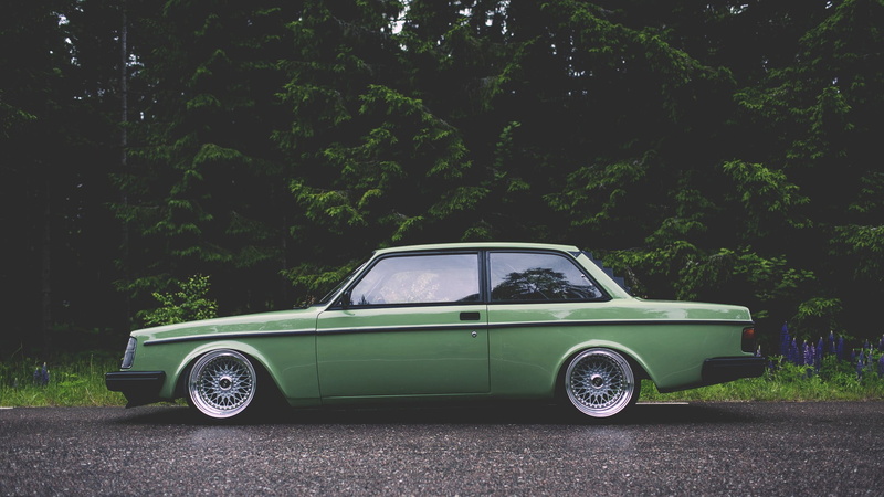 motor vehicle, land vehicle, mode of transportation, transportation, tree, coupe, Volvo, growth, vintage car, retro styled, parking, land, green, outdoors