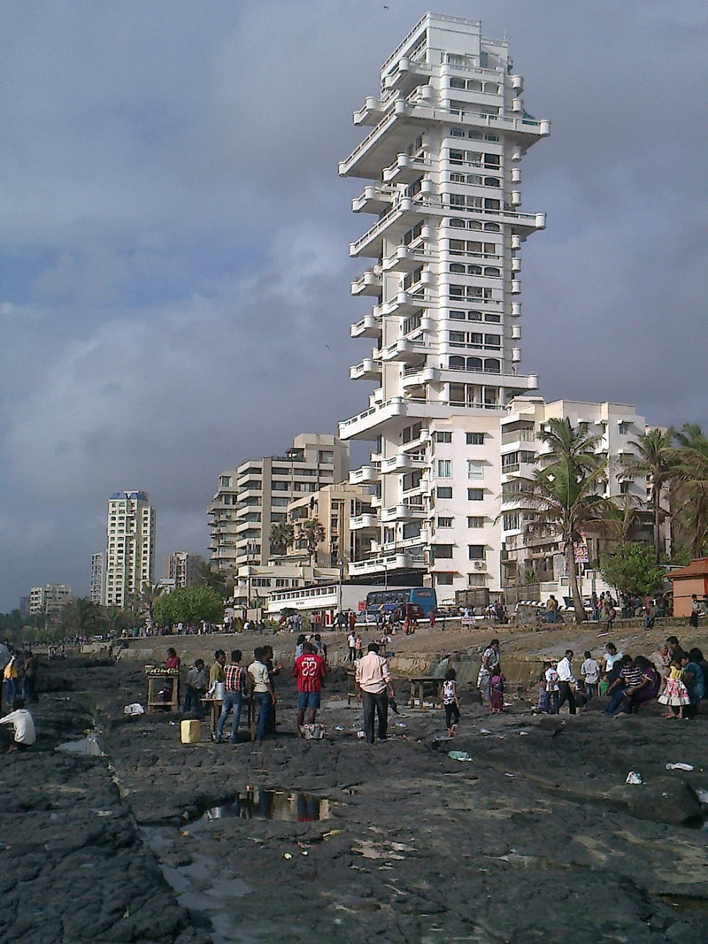 architecture, 2K, outdoors, Rocky, shore, men, real people, cloud - sky, adult, nature, highrise, building exterior, city life, skyscraper, coast, Sea