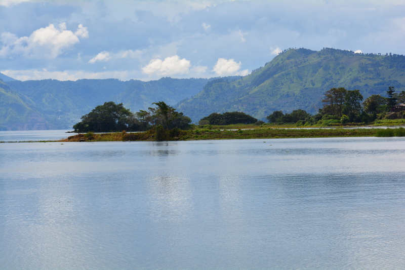 plant, mountain, sky, tranquility, indonesia, tree, reflection, beauty in nature, cloud - sky, no people, non-urban scene, lake, sumatra, idyllic, samosir
