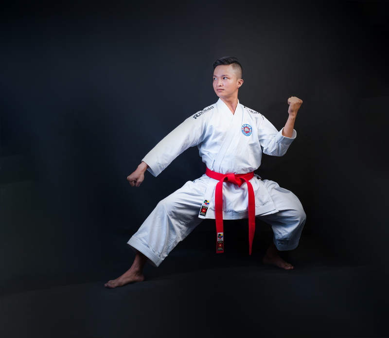 young adult, audience, teen, karate, men, young men, looking at camera, kicking, clothing, black background, finger, woman, wearing, human arm, indoors