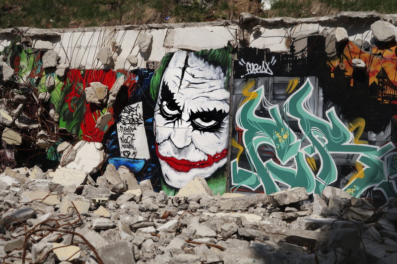 craft, day, representation, wall, nature, mask, gravat, art and craft, no people, male likeness, demolition, text, street art, land, human representation