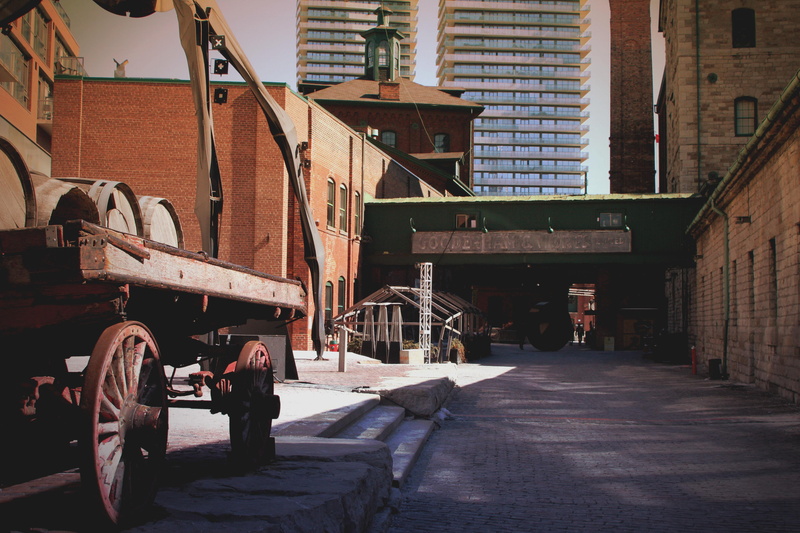 sunlight, building exterior, outdoors, construction site, people, machinery, men, built structure, industry, toronto, occupation, city, distillery district