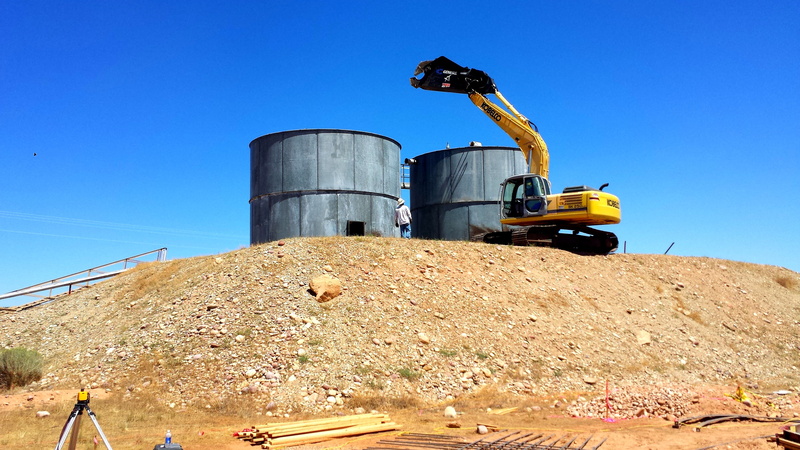 construction, outdoors, mining, steel, industry, refinery, fuel, land vehicle, machinery, factory, construction industry, mode of transportation, equipment