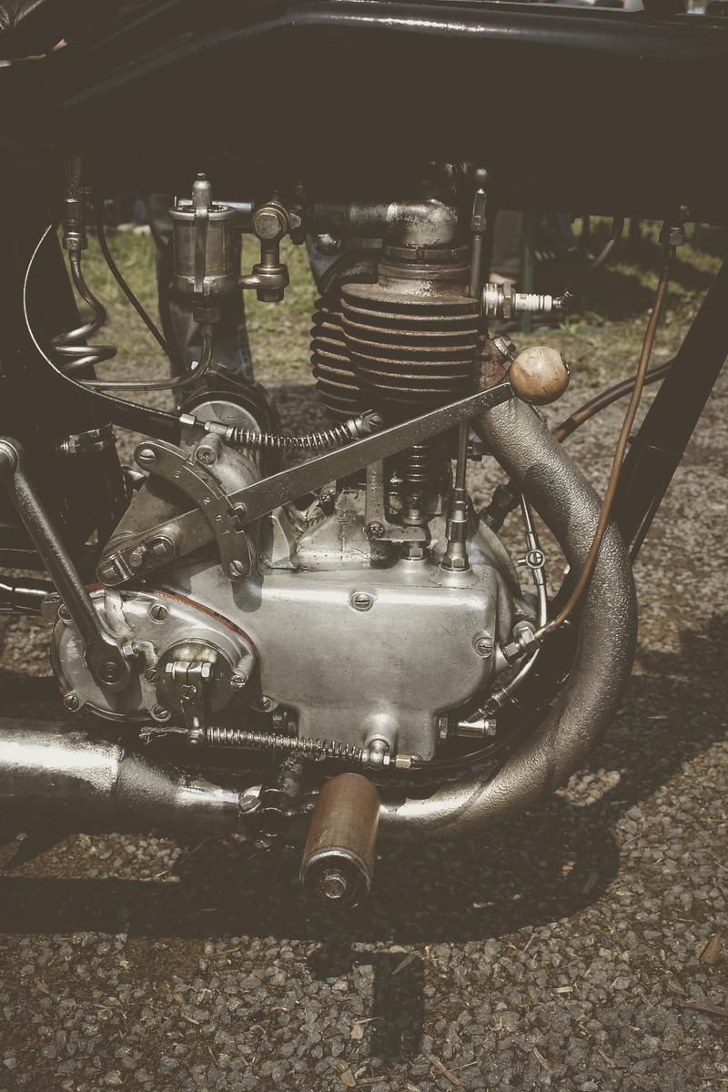 gearshift, turbine, gray, brake, land vehicle, garage, rotor, motorcycle, transportation, generator, still life, machine part, headlight, day, close-up