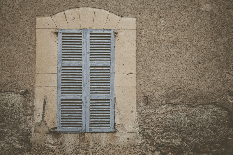 window, shutter, leisure activities, wall - building feature, walkway, metal, building, pattern, residential district, path, architecture, closed, curtain