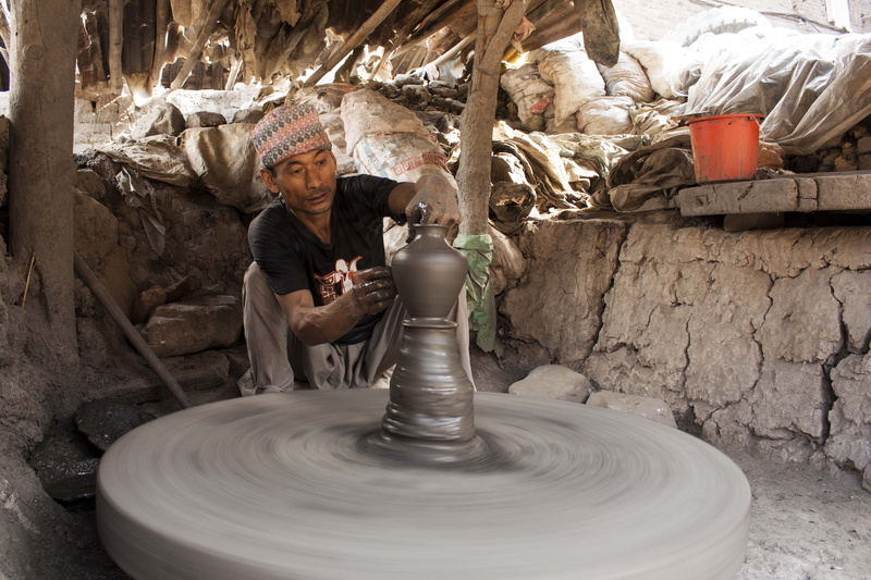 Bhaktapur, jug, working, artist, clay art, ceramics, potter, adults only, wheel, occupation, clay pot, sculptor, craft, spinning, earthenware, manufacturing