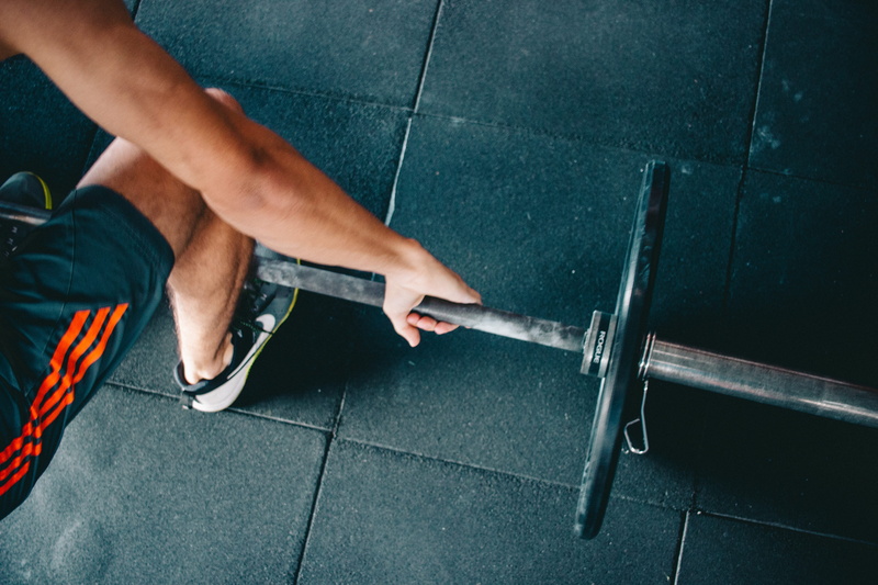 effort, hands, flooring, tile, weight, strength, human hand, legs, working, real people, hand, footwear, holding, action, adult, crossfit, low section