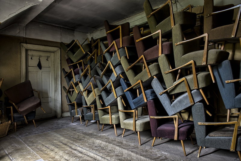 indoors, wooden floor, dopor, inside, day, in a row, pair, ceiling, armchair, wooden door, arrangement, room, door, white, chairs, stacked chairs, near