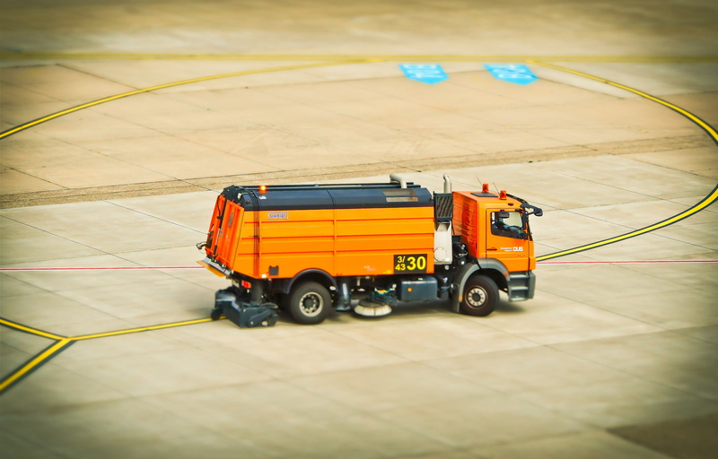 flooring, wheel, motor vehicle, no people, industry, equipment, cleaning vehicle, yellow, tilt shift, container, truck, mode of transportation, düsseldorf