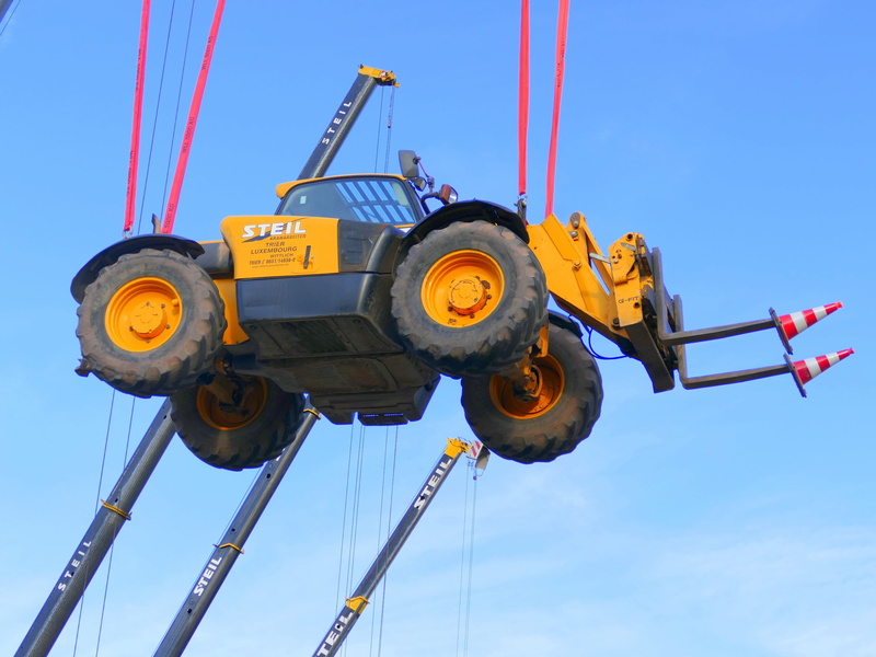 construction vehicle, machinery, pallet loading fork, sky, low angle view, nature, vehicle, technology, industry, day, 2K, crane, transportation, outdoors
