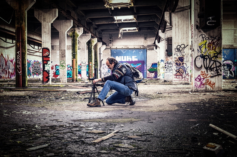 fun, holding, forget, building exterior, hall, camera, greasy, graffiti, photograph, joy, one person, pforphoto, jeans, tunnel, lifestyles, men, art, depression - sadness