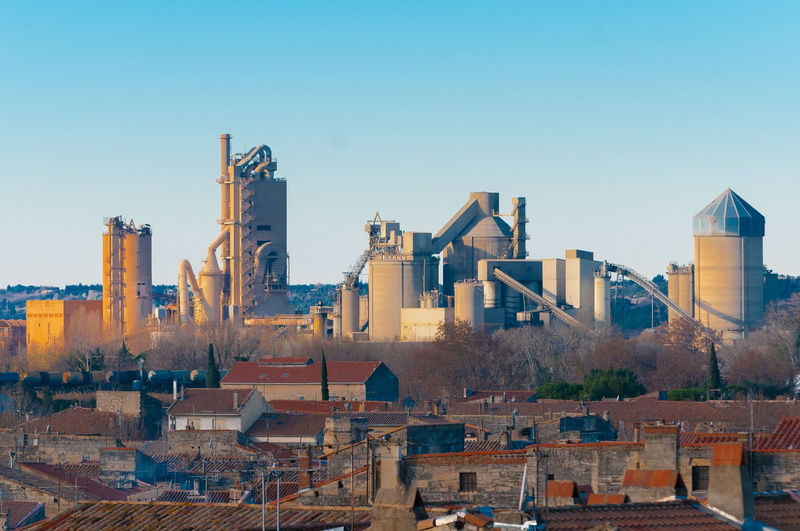 architecture, day, high angle view, outdoors, cityscape, skyscraper, city, industrial heritage, nature, sky, built structure, clear sky, industrial area