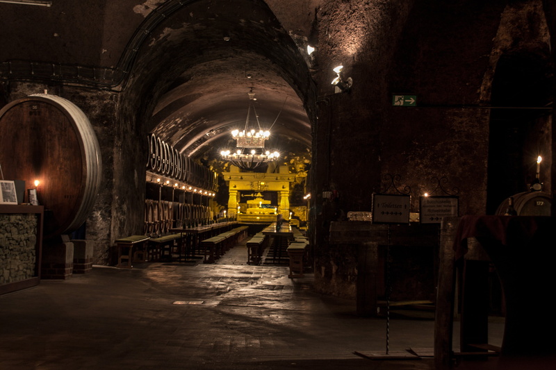 wooden barrels, wine storage, architecture, night, lighting equipment, illuminated, wine barrels, electric lamp, religion, no people, barrel, arch, built structure