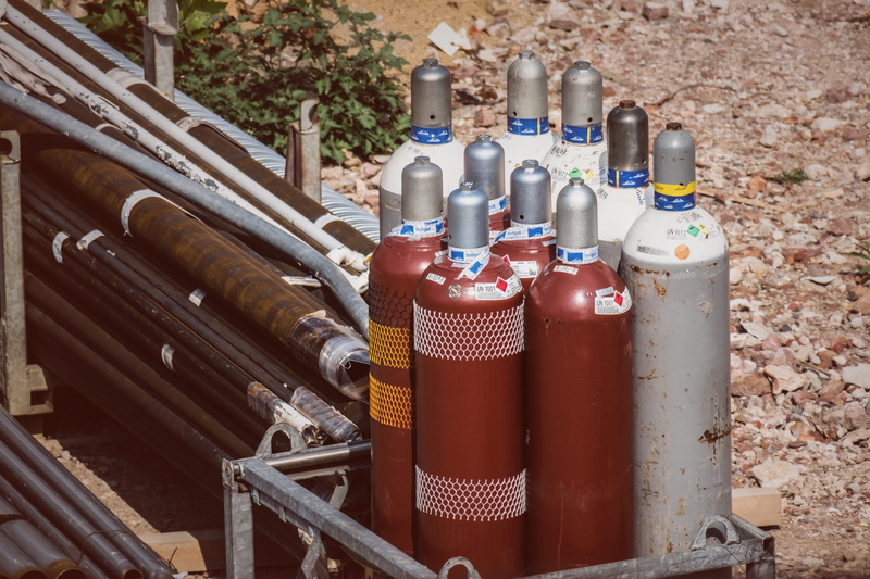 day, cylindrical closure, metal, red, close-up, refilling, fire extinguisher, cylinder, pipe - tube, fuel and power generation, still life, outdoors, group of objects