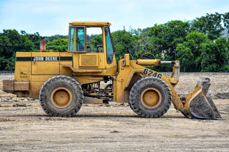 road, nature, construction site, land vehicle, bucket, digger, construction, work, industrial, heavy, construction industry, no people, yellow, bulldozer