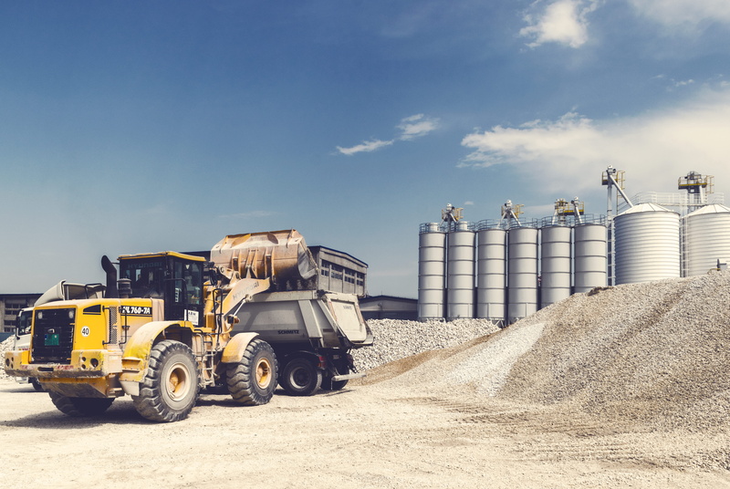 gravel, equipment, outdoors, machinery, industry, mode of transportation, technology, heavy equipment, sky, nature, power, soil, low angle view, clouds