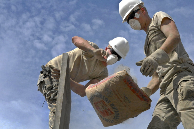 building, cloud - sky, cement, labor, structure, workers, holding, two people, person, dropping, people, young adult, adult, job, 2K, nature, bag, day