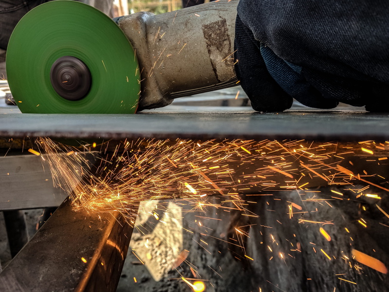 occupation, workshop, construction, industry, real people, long exposure, metal work, factory, indoors, blurred motion, worker, manufacturing equipment